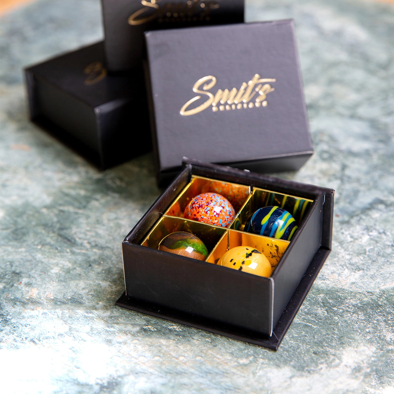 4 bonbons in luxe box met eigen logo